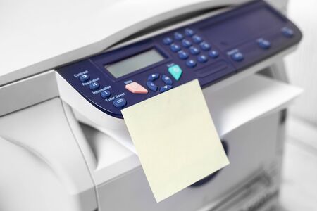 Printer, copier, scanner on color background . Office table.copy space