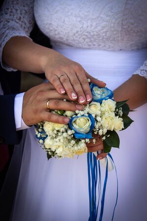 hands, rings, bouquet, wedding photosの写真素材