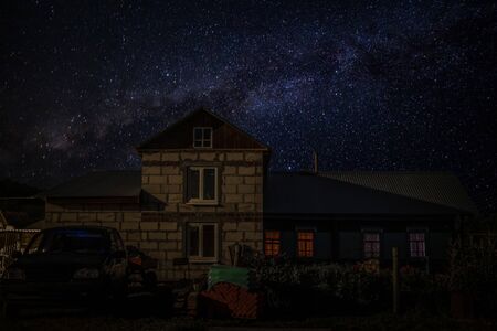 night landscape, starry sky in a Russian village.の写真素材