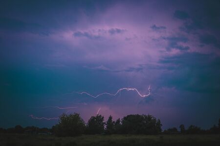 night landscape with lightning and thunderstorms in the Russian Federationの写真素材