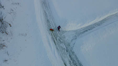 winter village and strolling localsの写真素材