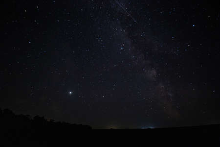 milky way dark night filmed in a Russian village. High quality photo