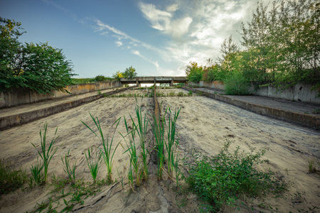 concrete dam in the countryside.の写真素材