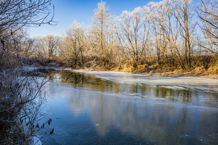 the first frosts and the frozen river.
