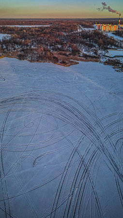car tire tracks on ice.の写真素材
