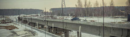 construction of a reinforced concrete bridge in winter.の写真素材
