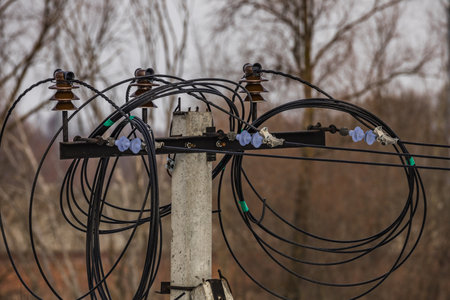 the wires are twisted on the pole.