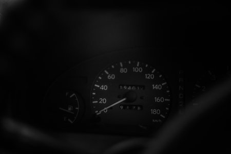 the dashboard of the car is in black and white.