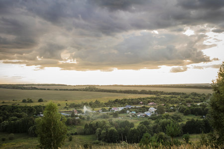 cloudy landscape at sunset in the countryside.の写真素材