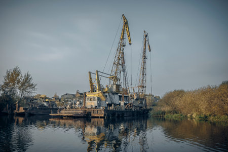 cargo cranes at the port on the Pregolya river in Konigsberg.の写真素材