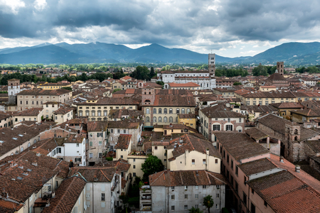 View over Italian town Lucca with typical terracotta roofsの写真素材