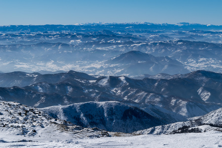 Winter landscape with mountain ranges, Mountain National Park Kopaonik, Serbiaの写真素材