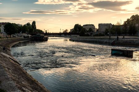 NIS, SERBIA - May 3, 2019: Nis fortress and University building, at banks of Nisava river with floating coffee bar. Nis is the third largest city of Serbia, Europeのeditorial素材
