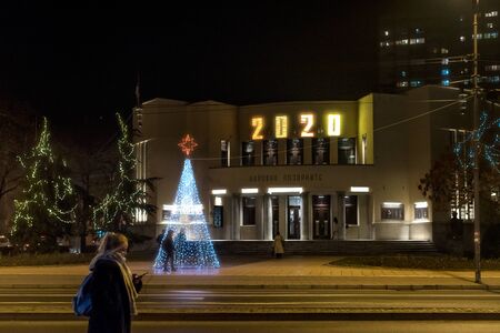 Nis, Serbia - December 18, 2019: Christmas and New Year 2020 decorations and illuminations. Serbian National Theater in Nis Decorated for New Year 2020のeditorial素材