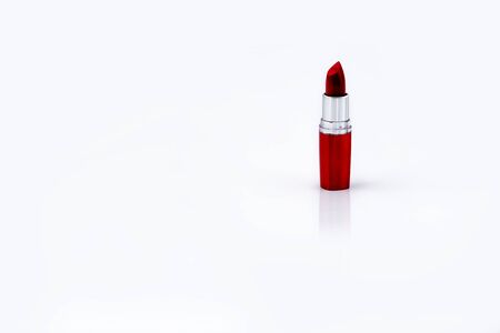 Red Lipstick on white background. Lipstick for professional make up with Copy Space. Lip care concept. Water resistant high quality lipstick product - Daily make upの写真素材