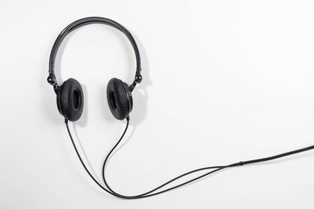 Black electronic headphones isolated on the white backgroundの写真素材