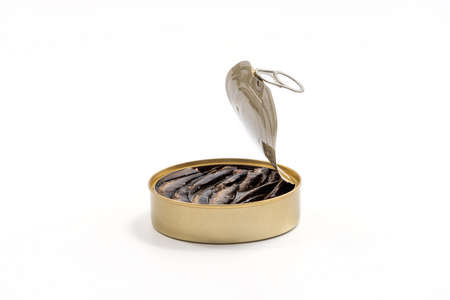 Smoked sprats in cooking oil in the open tin can isolated on white backgroundの写真素材