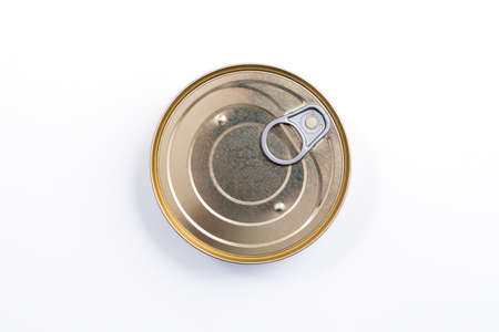 Round metal can top view. Food container isolated on white - for fish, ham, meat, vegetables. Round preserve box.の写真素材