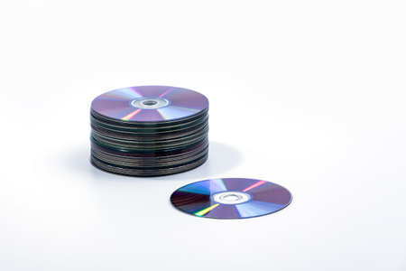 CD and stack of Compact Discs isolated on a white background
