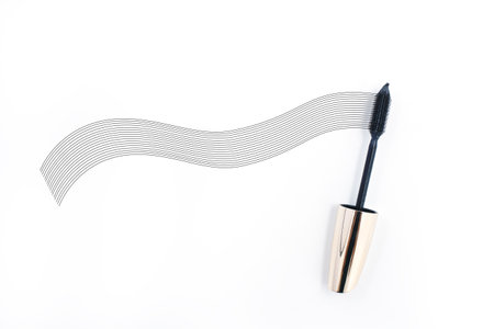 Stroke of black mascara with applicator brush close-up, isolated on white backgroundの写真素材