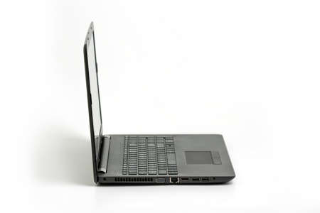 Laptop isolated on white background - side viewの写真素材