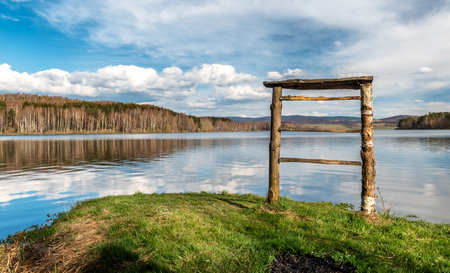 Vlasina lake scenery with beautiful clouds in the blue sky. Beautiful semi-artificial lake in Southeast Serbiaの写真素材