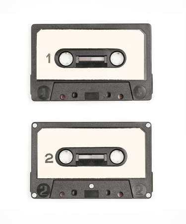 Old Vintage Audio cassette tape - both sides 1 and 2 isolated on a white backgroundの写真素材