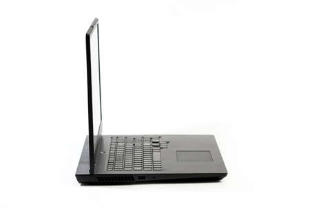 Large open Laptop  isolated on white background - Side viewの写真素材