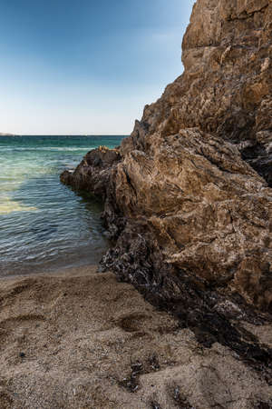 Wonderful views of the blue Mediterranean Sea. Sunny rocks, calm sea water.の写真素材