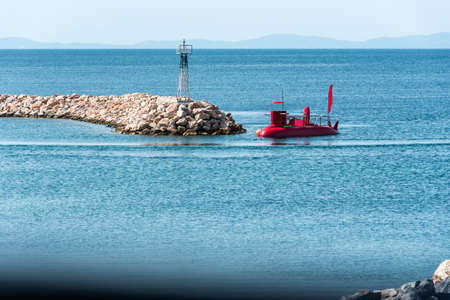 Red Sightseeing Submarine - Starfish Designed similar to a small boat, with the passenger 

area just a couple of inches under the sea level to observe the underwater worldの写真素材