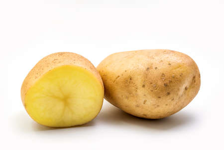 Potato - Whole and sliced in half Potato Isolated on white backgroundの写真素材