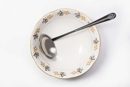 Luxury Vintage Porcelain tableware - Soup Bowl with ladle on white background, top viewの写真素材