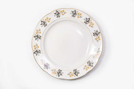 Luxury Vintage Porcelain tableware - Large Plate on white background, top viewの写真素材