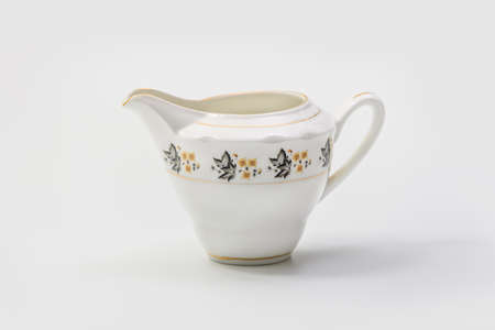 Luxury Vintage Porcelain coffe or tea set - Milk Pot on white backgroundの写真素材