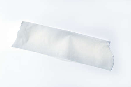 Close up of an adhesive tape on white background with clipping path includedの写真素材