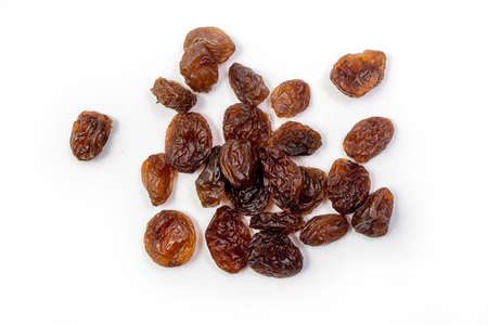 Raisins on white background, dried seedless grapes. Isolated Raisinの写真素材