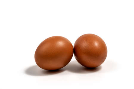 Two eggs isolated on white background with clipping paths for graphic design. The food is 

obtained from chicken that is high in protein and suitable for healthの写真素材