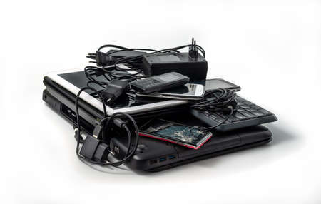 Electronic waste ready to recycle, isolated on white background.  pile of mixed electronic waste,...