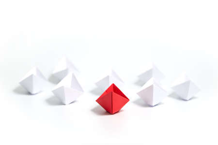 Red and white paper boats. Concept of leadership boats for teamwork group or success.の写真素材