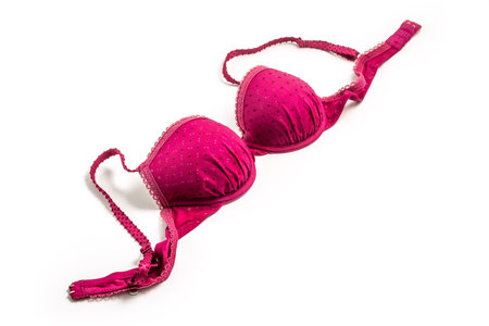 Pink - purple female bra isolated on white backgroundの写真素材