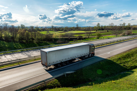 Large Transportation Truck on a highway road through the countrysideの写真素材