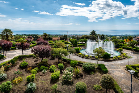 Zafferana Etnea, fountain and sea view, near Mount Etna, Sicily, Italyの写真素材