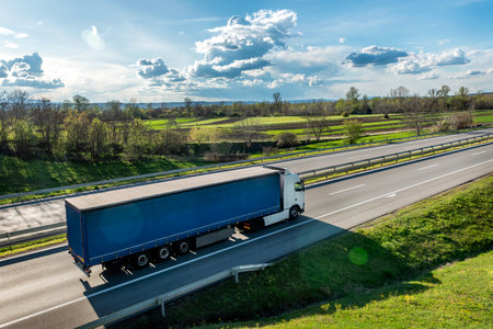 Large Transportation Truck on a highway road through the countrysideの写真素材