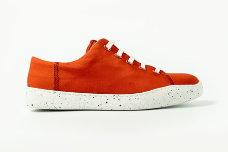 Red sneaker isolated on white background - Side Viewの写真素材