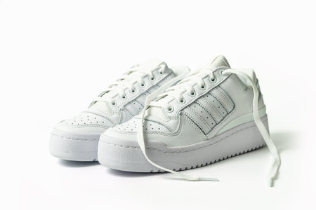 White tennis shoes isolated on white backgroundの写真素材