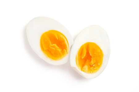 Fresh hard boiled chicken eggs isolated on white, top viewの写真素材