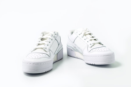 White tennis shoes isolated on white backgroundの写真素材