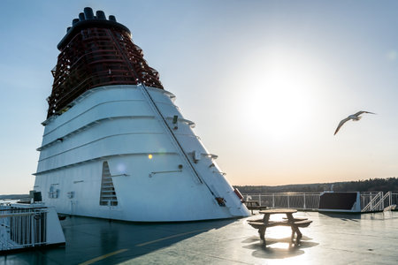 Cruise Liner chimney exhaust. A close up photograph of the chimney exhaust on the line cruiseship ferry, taken in Stockholm Aechipelago, Sweden at sunset.の写真素材