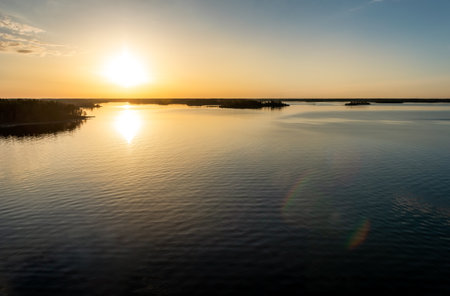 Sunset at Stockholm Archipelago. The archipelago extends from Stockholm 60 kilometres (37 miles) to the Baltic Sea at eastの写真素材