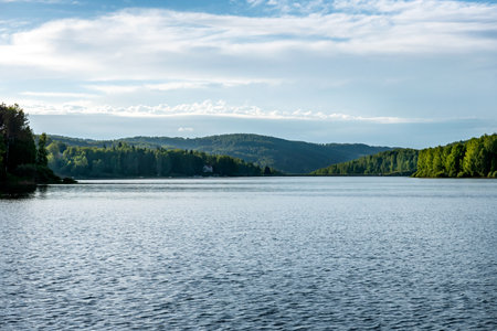 Vlasina lake beautiful summer scenery with beautiful clouds in the blue sky. Beautiful semi-artificial lake in Southeast Serbiaの写真素材